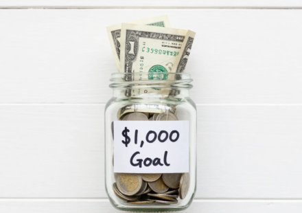 save your first $1000 fast with a coin jar savings goal plan