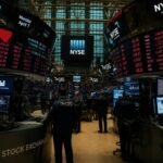 why is the stock market moving today — traders react to CPI inflation data on NYSE floor